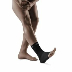 CEP Ortho+ Ankle Sleeve - Black (WO12V6) -Darn Tough Shop Ankle Sleeve black grey WO12V6 m front model web 1800x1800 a44602e5 0600 42de a6fa d810da398421