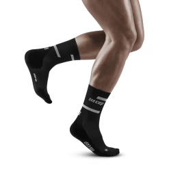 CEP Men's 4.0 Mid Cut Compression Sock (WP3C) -Darn Tough Shop The Run mid cut 4.0 black men 1 1800x1800 9bac5f7b 08a5 42fa a1ca 323991655099