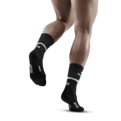 CEP Men's 4.0 Mid Cut Compression Sock (WP3C) -Darn Tough Shop The Run mid cut 4.0 black men 2 1800x1800 e5d144a1 30b8 4ba1 a14e 4e6212b8737d