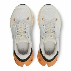 On Running Women's Cloudflyer 4 -Darn Tough Shop cloudflyer white copper on running 1 min