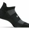 Feetures! High Performance Ultra Light No-Show Tab Running Socks - Black (FA5501) -Darn Tough Shop hp ul tab black sock on foot form 2